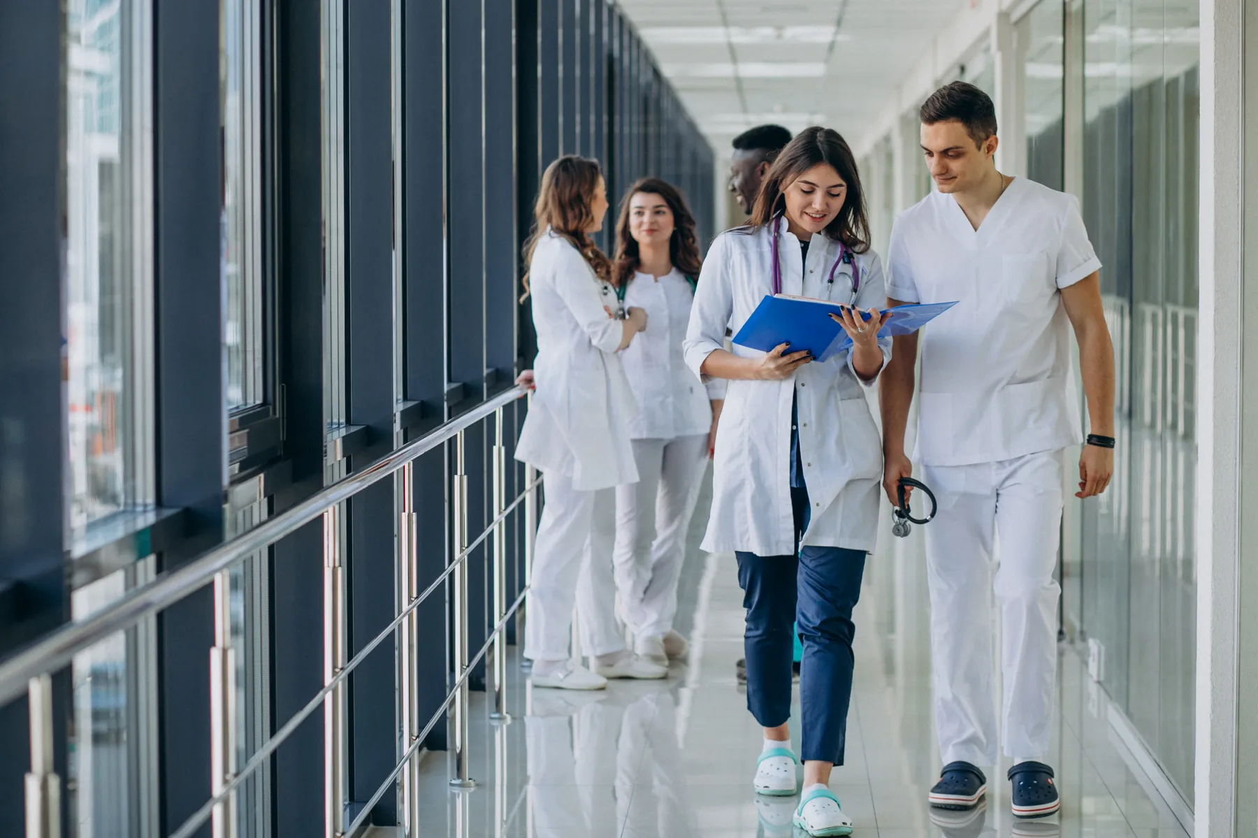 Care team in a hospital corridor